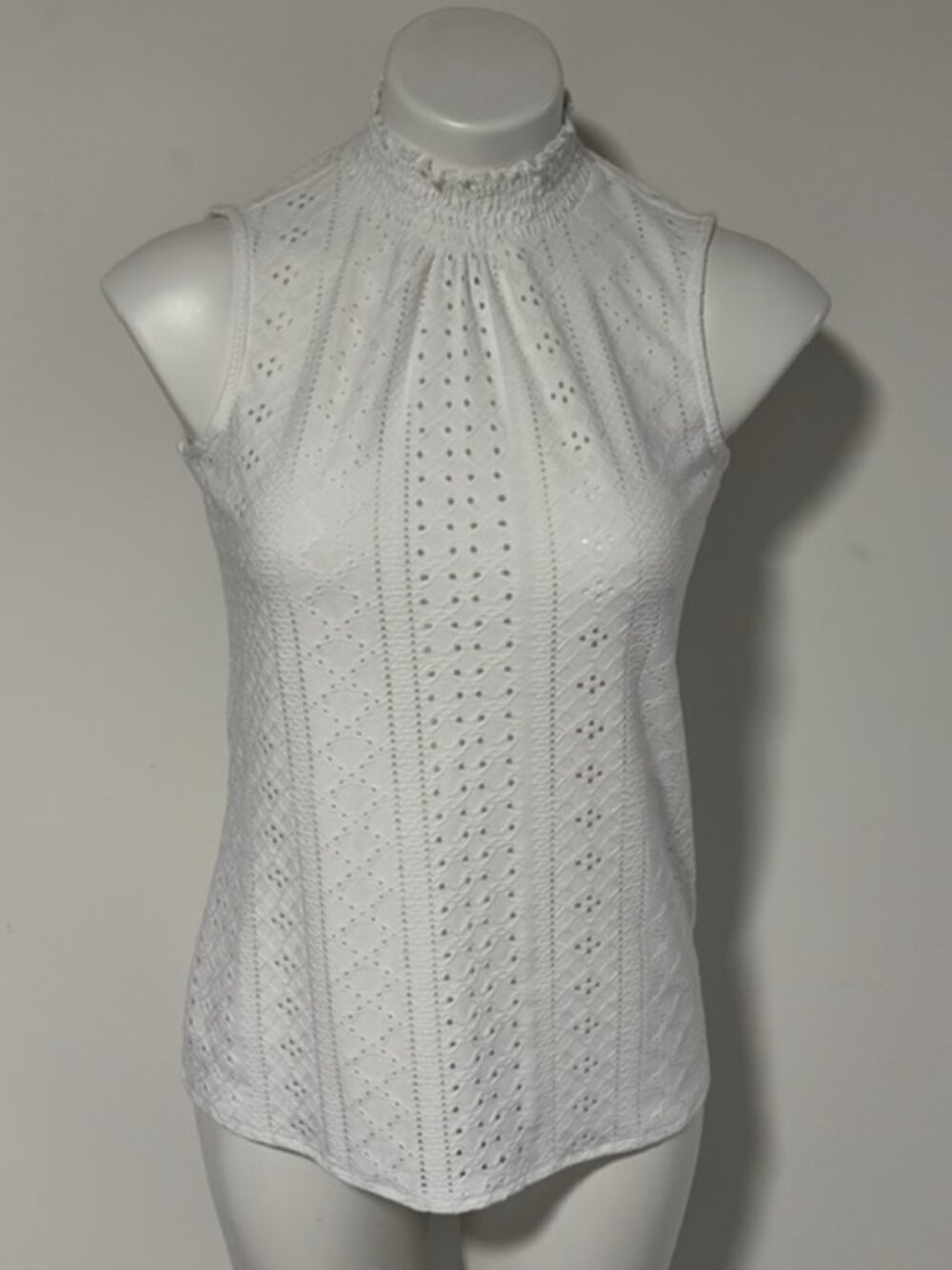 FAITH & ZOE ELASITIC HIGH NECK SLEEVELESS CREAM TOP WITH EYELETS XS